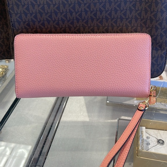 MICHAEL KORS
Leather Continental Wristlet Phone Case Wallet 
Primrose 
NWT - Picture 12 of 16